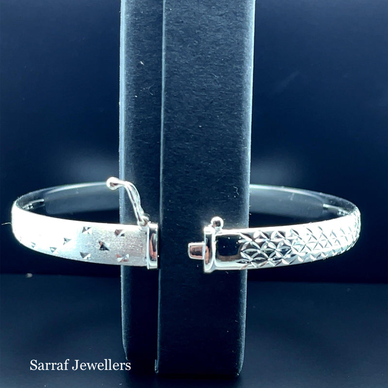 Silver Ladies Frosted Hinged Bangle Oval Diamond Cut Design | Shop Online Sarraf Jewellers UK - Sarraf Jewellers